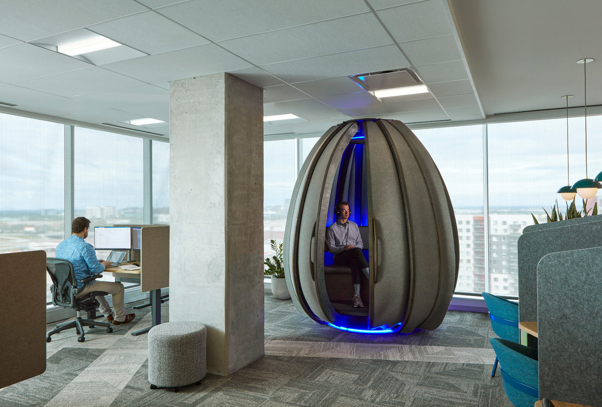 Lotus meditation pod in a corporate office with city views